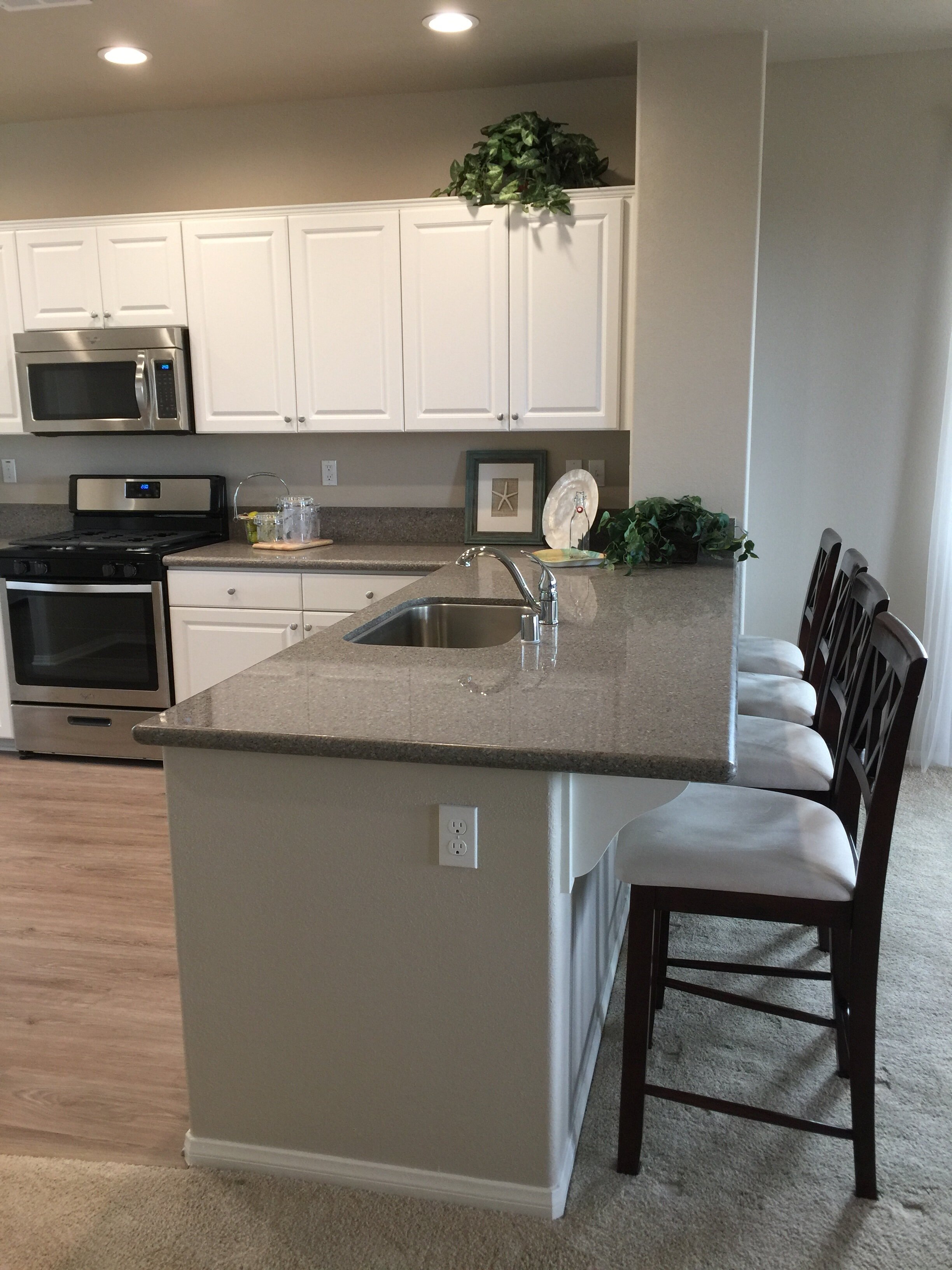 Plan 1826 - Kitchen with White Thermofoil Cabinets