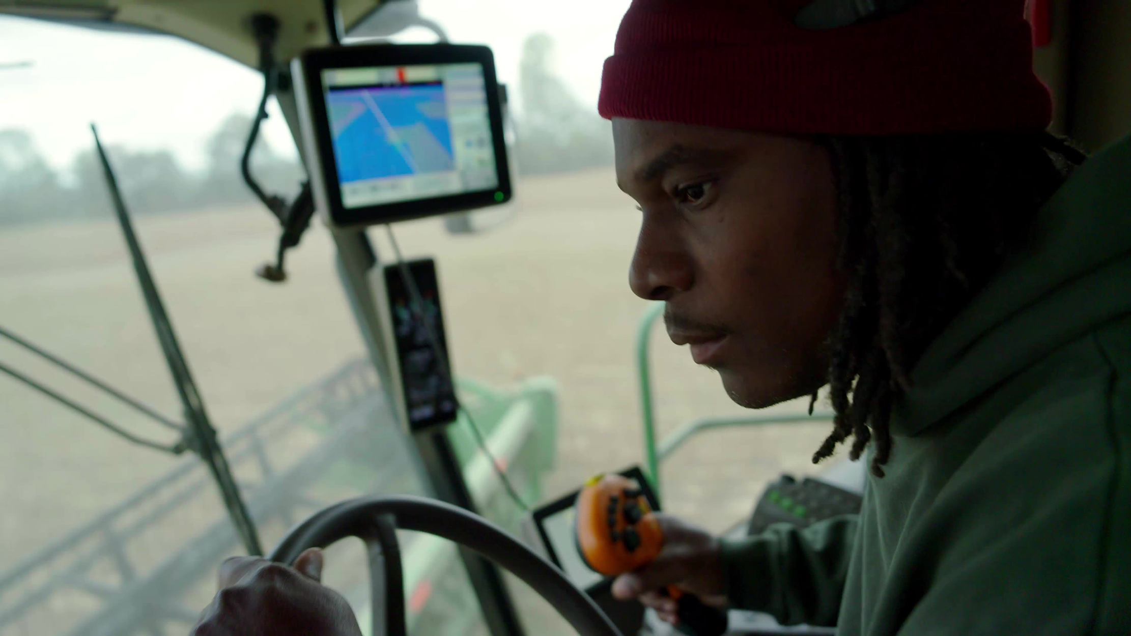 Harvest family member driving.