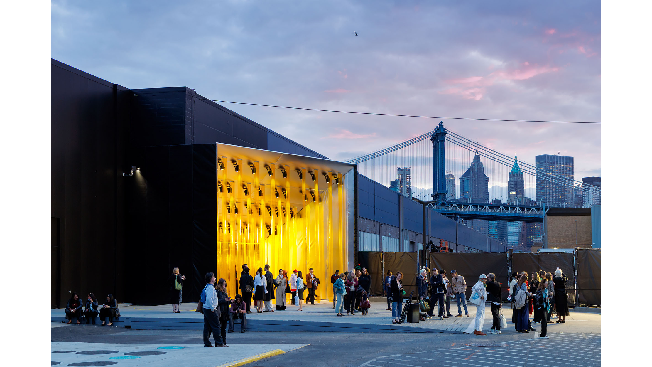 Independent art building with Manhattan bridge in the background.
