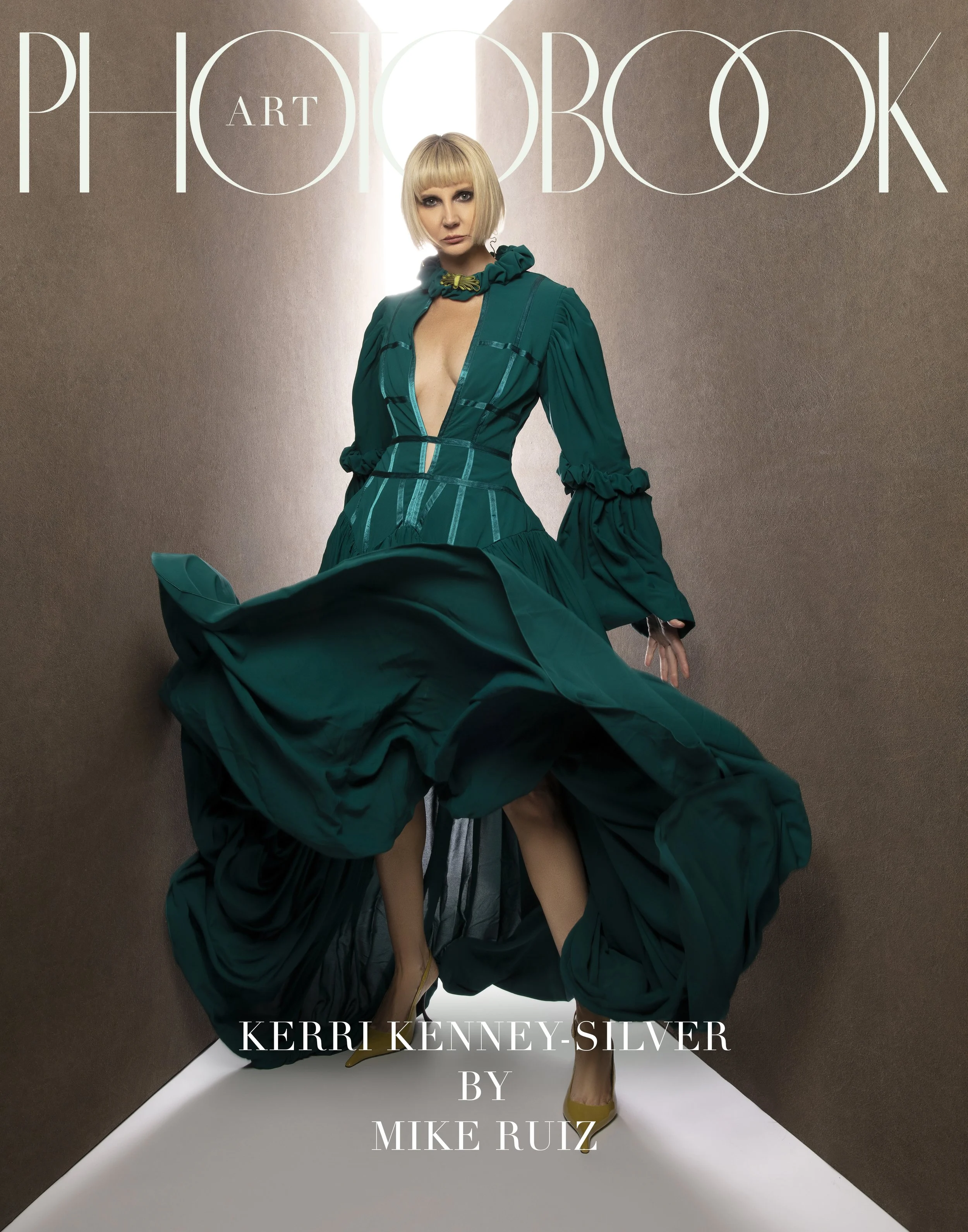 Kerri is wearing a green flowy dress.