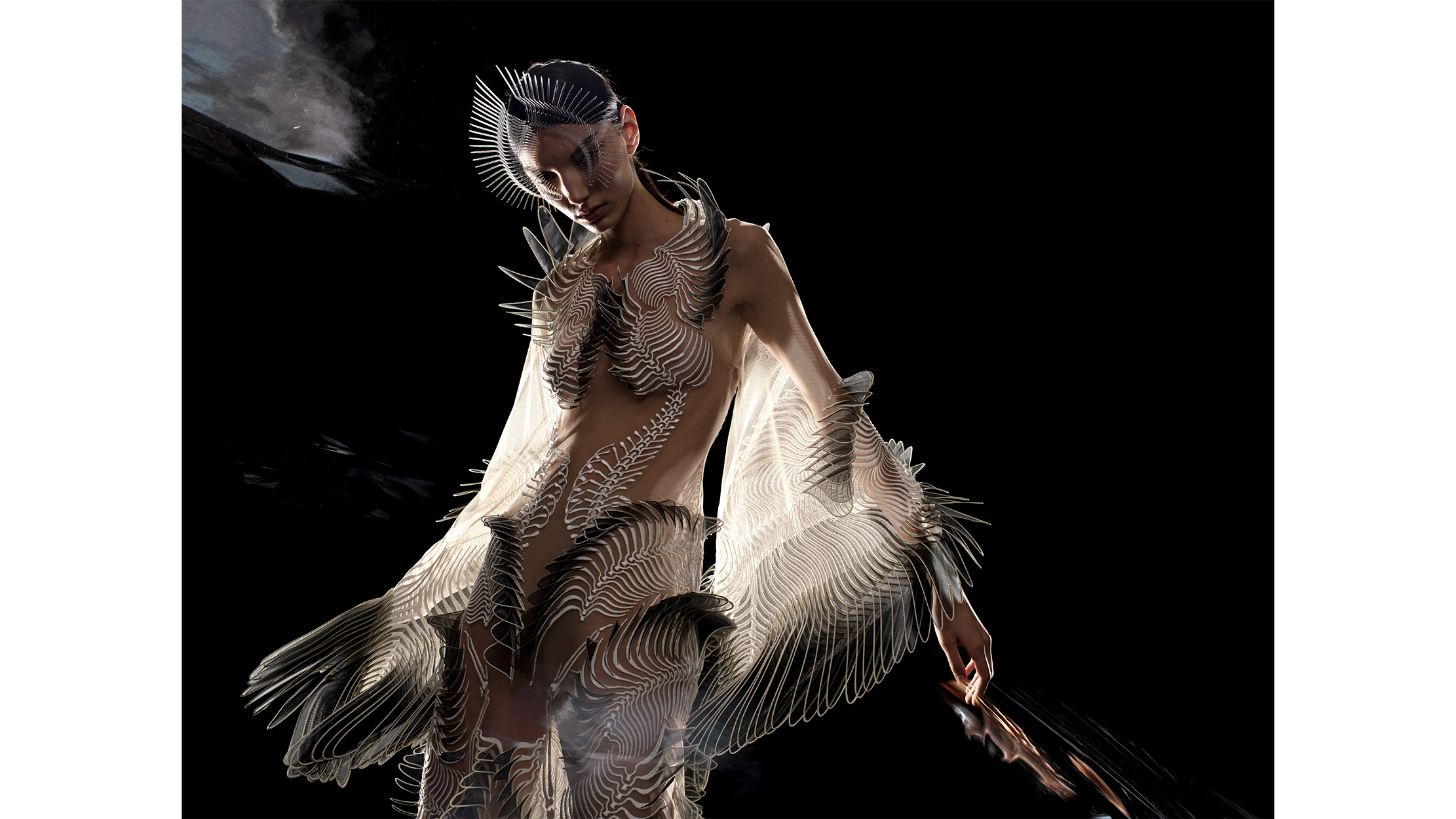 Model in feather-like dress.