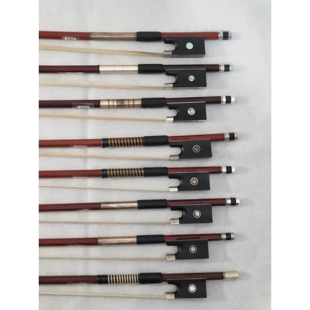 A selection of violin bows for sale in Boston.