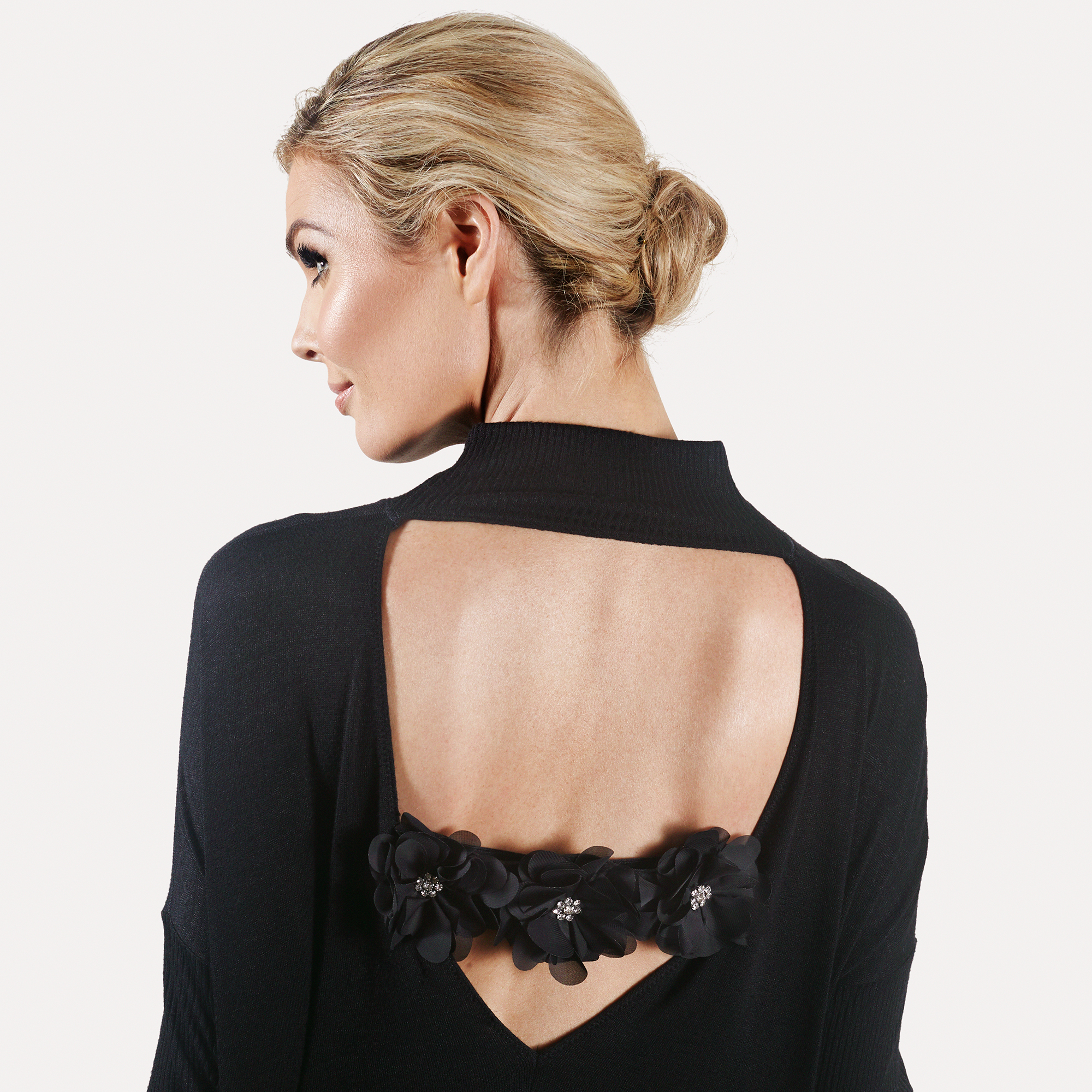 model with black sweater and organza flowers.jpg
