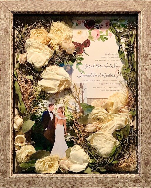 11x14” shadow box with silicate preserved flowers, 5x7 photo and invitation.
