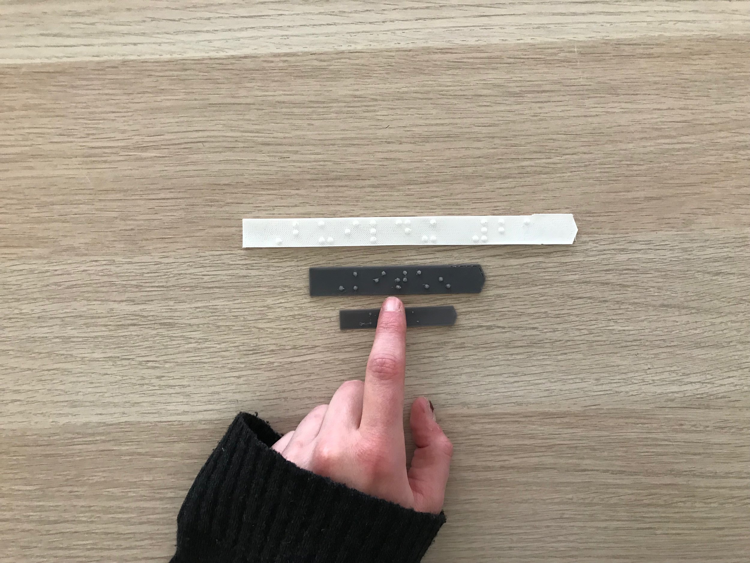 Braille Labels 3D Printed.jpeg