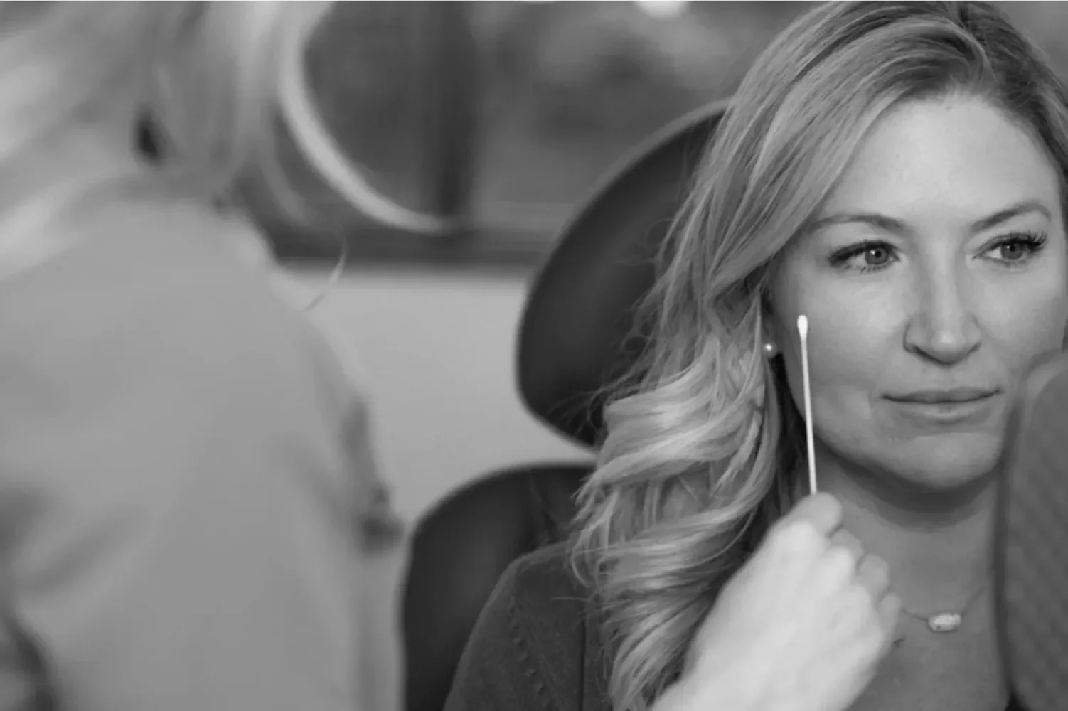 Dr. DeRosa with a cosmetic dermatology patient in a free consultation