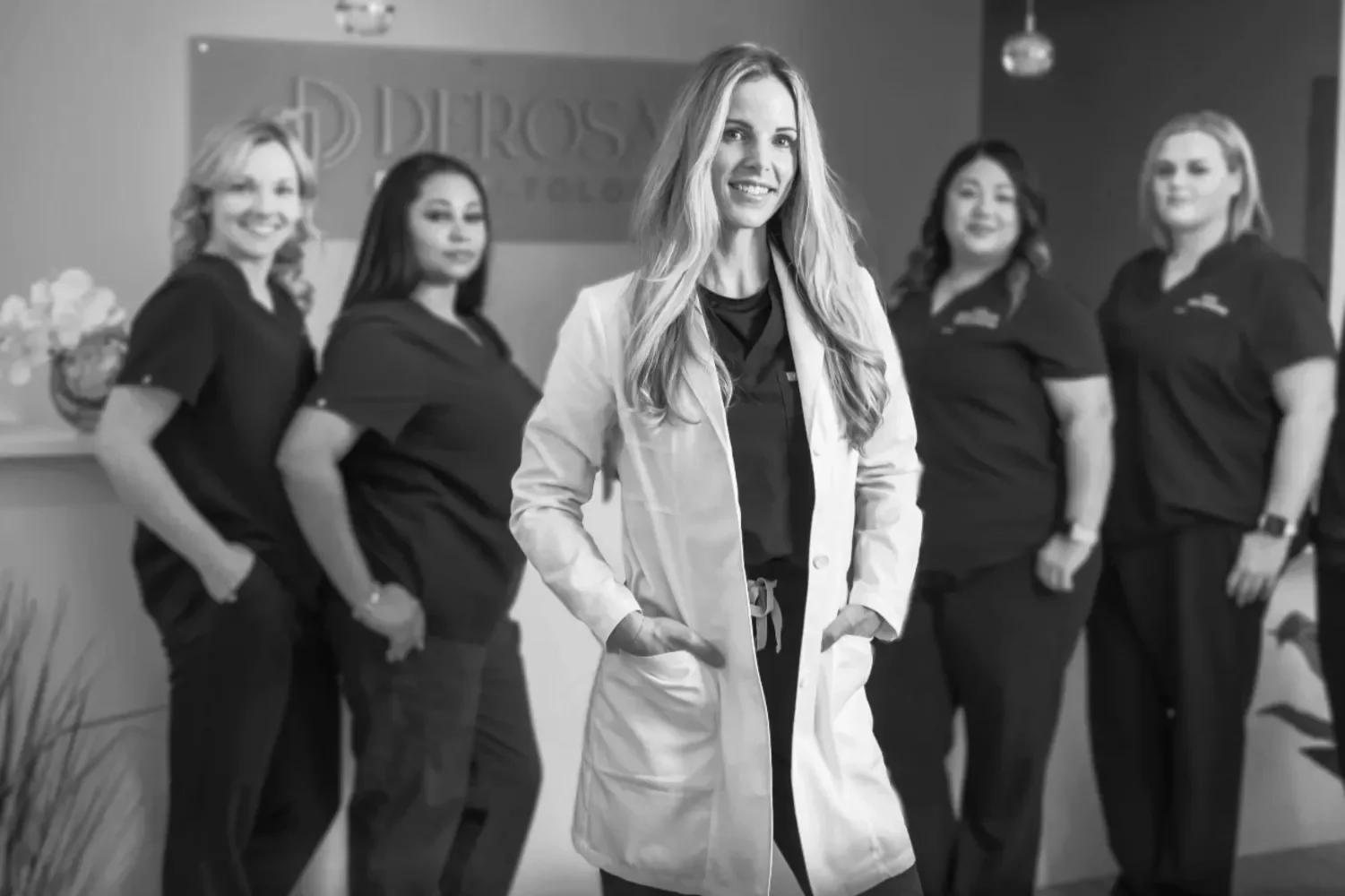 DeRosa Dermatology staff with Dr. Ivy DeRosa featured in front