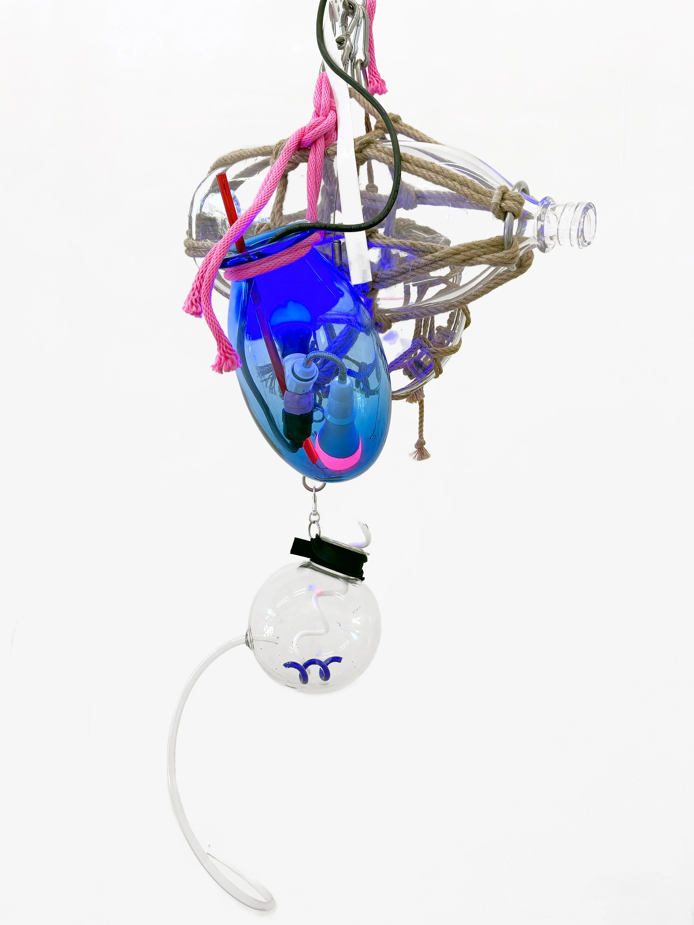 Elias Hansen "All of them gods are just about the same" 2025. Glass, leather, light, rope, silver, steel, vinyl.
Dims variable