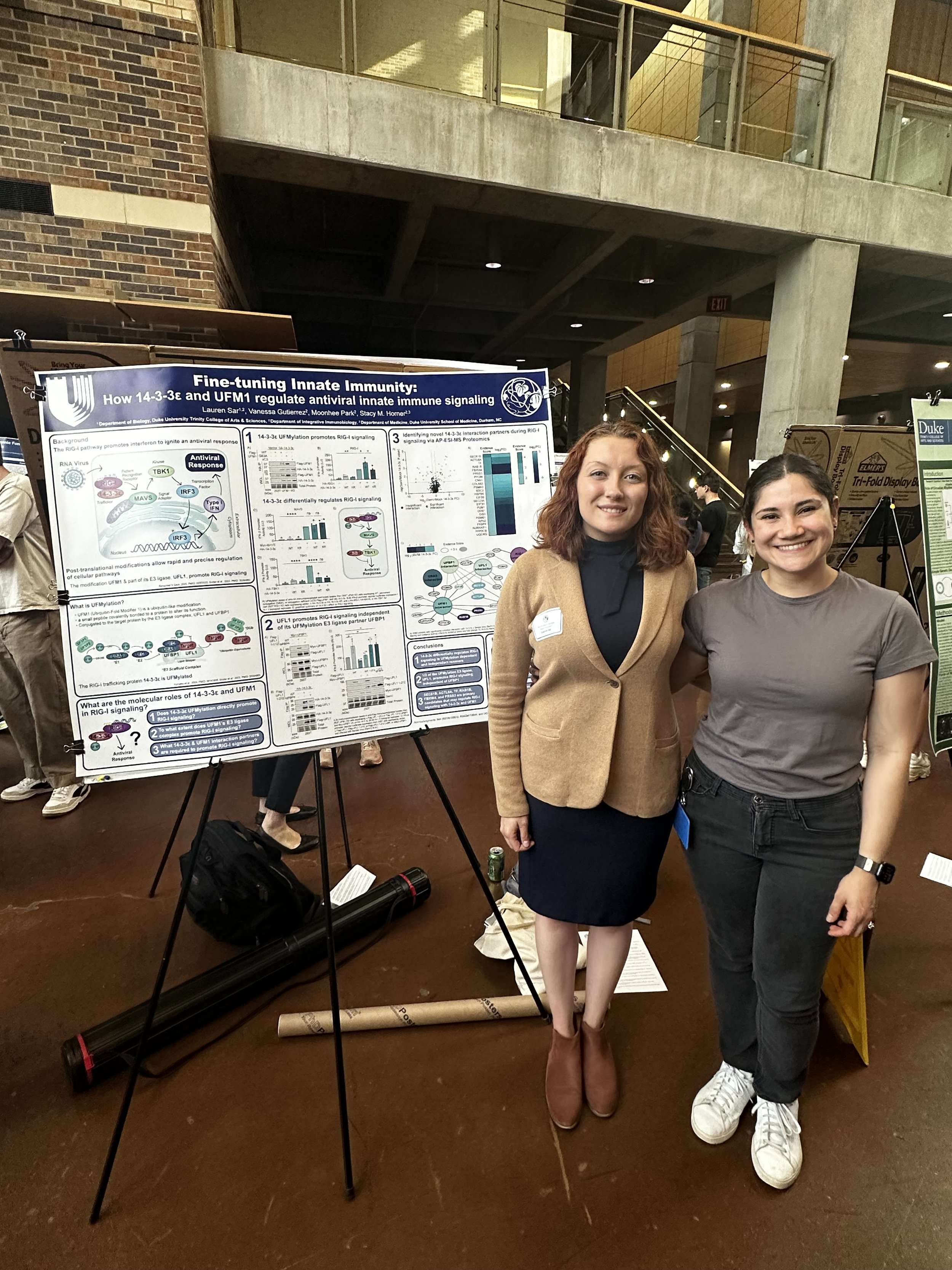 2025: Lauren presents her honor's thesis poster along with mentor Vanessa.