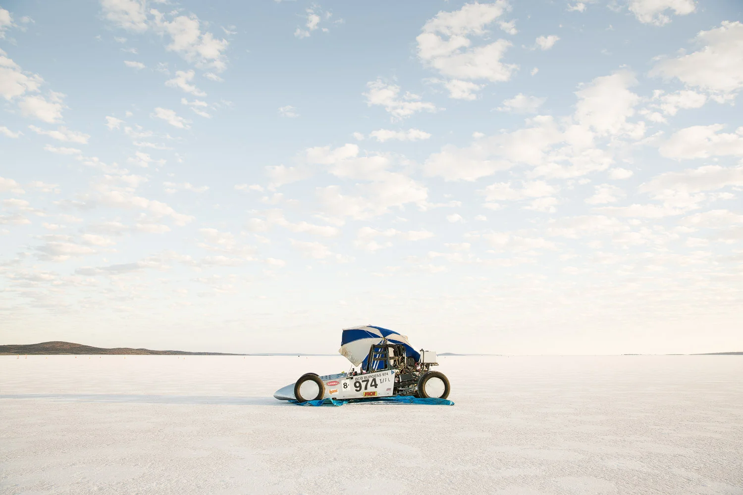 racing-car-with-umbrella-parked-on-salt-lake-2.jpg