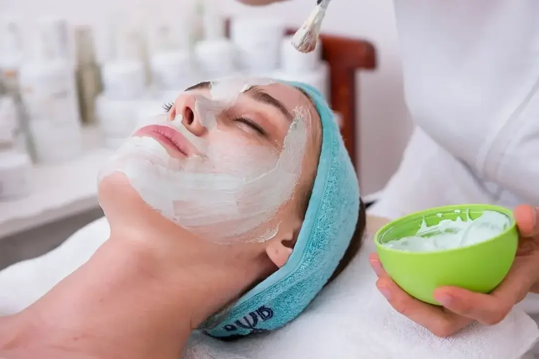 Woman having a facial treatment at Massage Studio KC