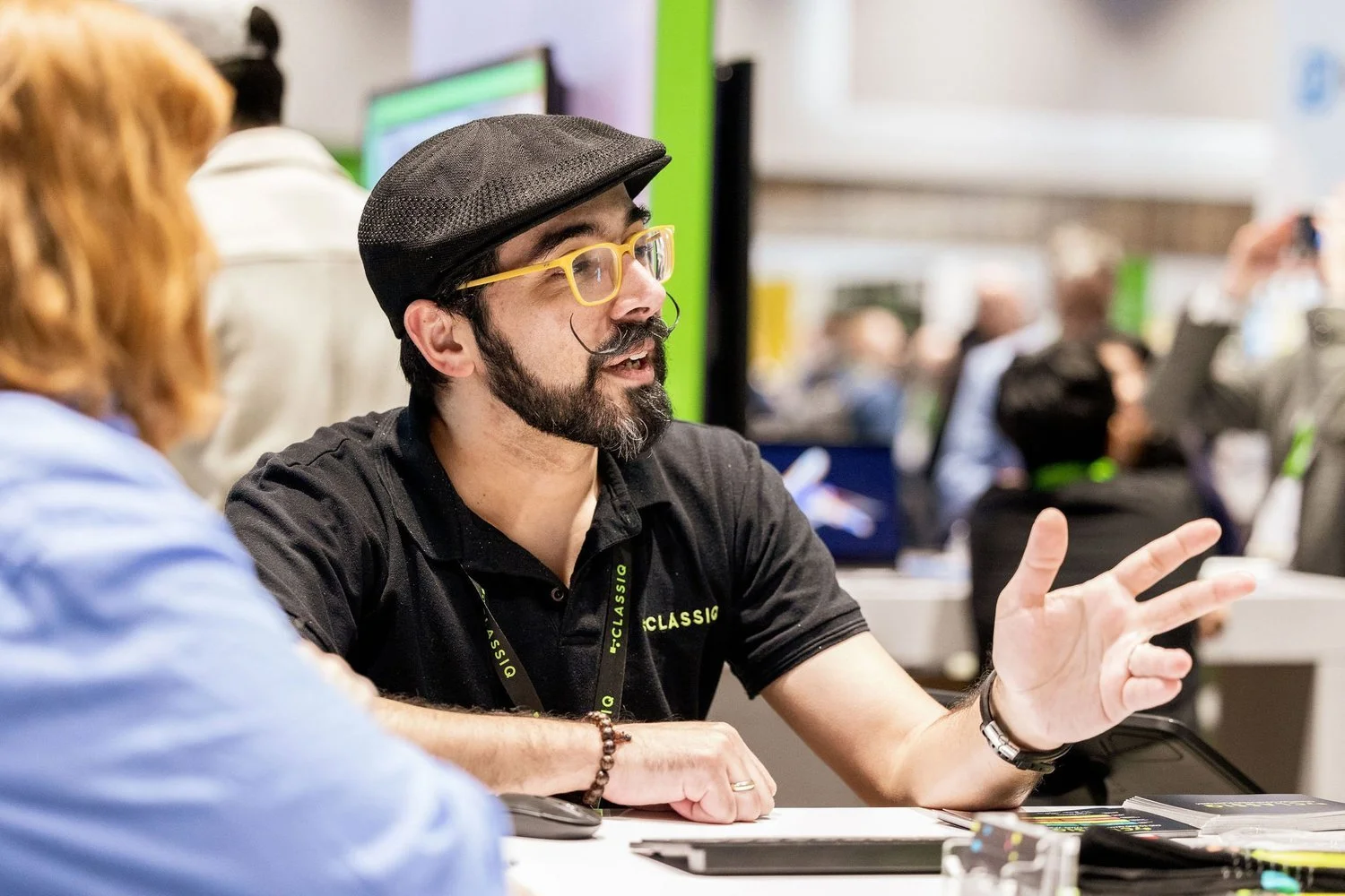 Nvidia vendors with clients at a GTC booth