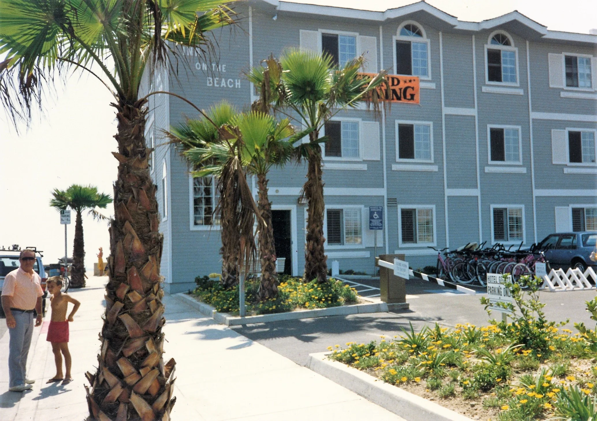 1. Chris and Grandpa parking lot Inn on the Beach.jpg