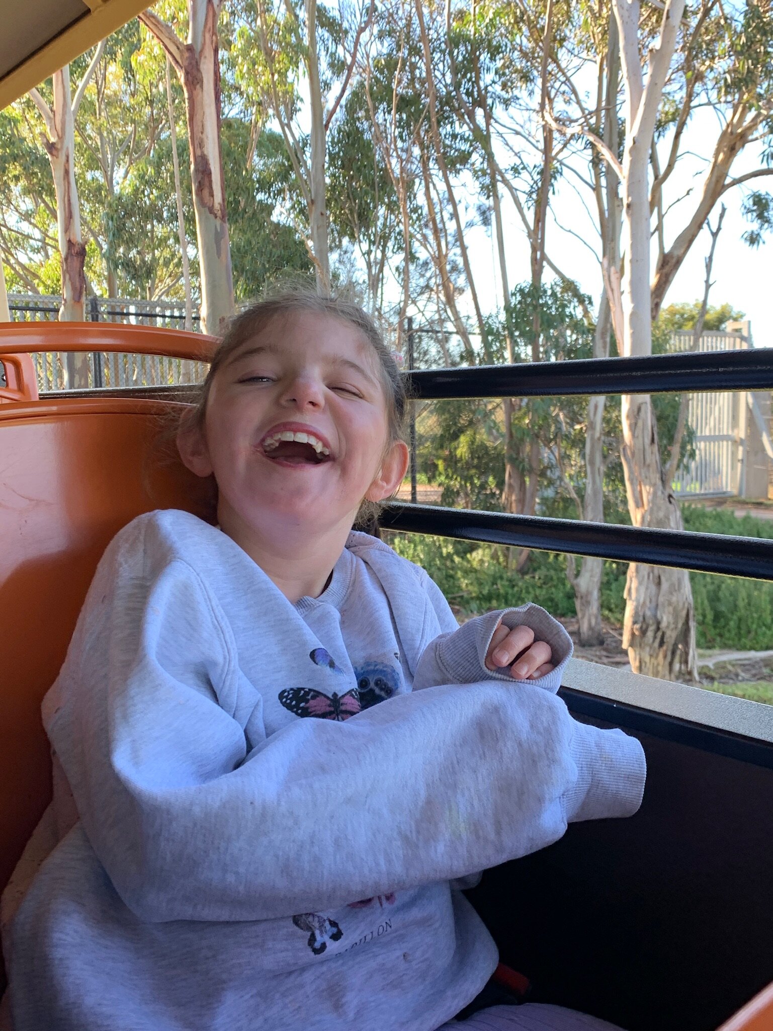 All smiles onboard the Safari Bus at the Werribee Zoo