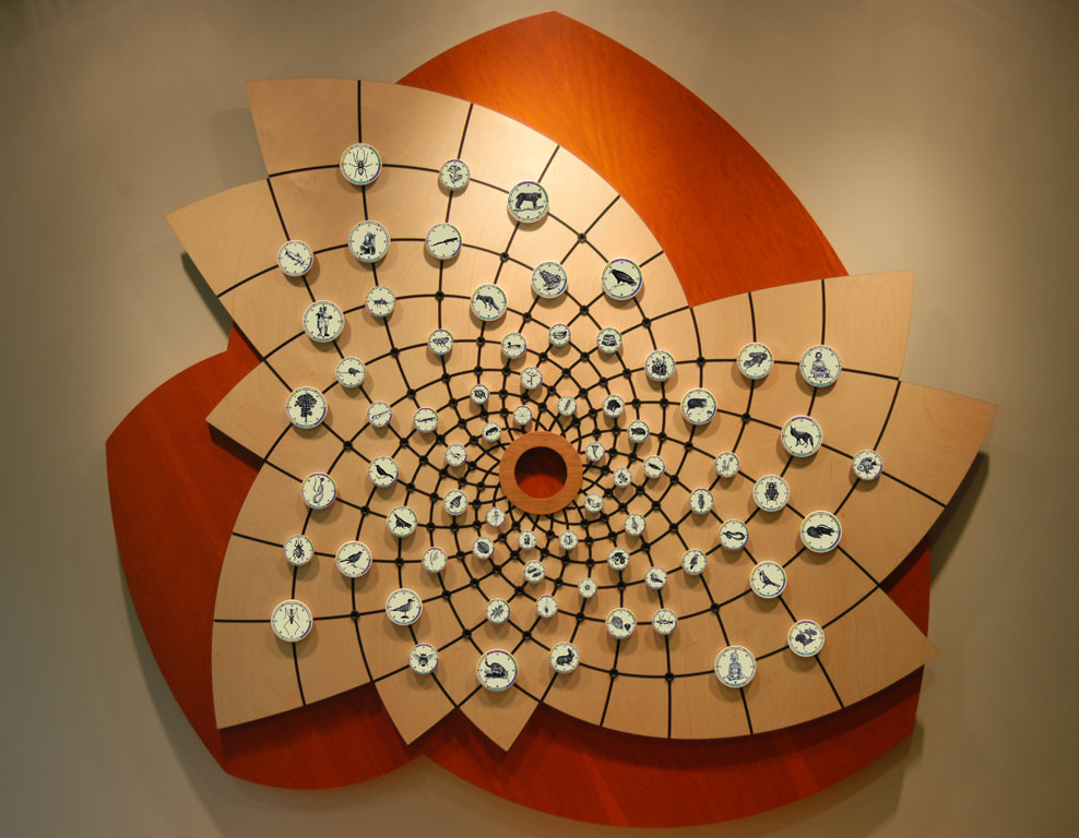  Connection Web: 6’ 4” x 5’ 9” x 2” Baltic birch and cherry wood ply, Delrin, aluminum, Corian, porcelain with decals, steel and polycarbonate locking mechanism :: 2009.  Connection Web is a display system that is studded with small porcelain tiles i