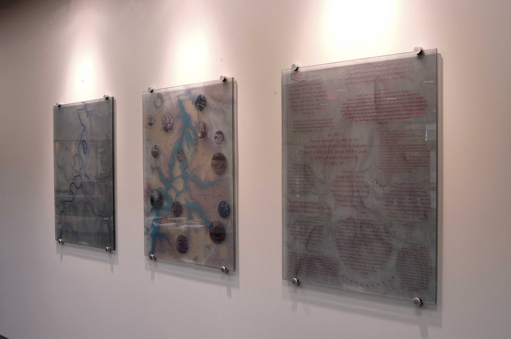  Mapping Community: Actual panels are 30” x 39”, and are composed of tempered glass, acrylic, double surface printing, metal stand offs :: 2009.  Because the actual maps are both translucent and reflective, they are quite difficult to photograph. 