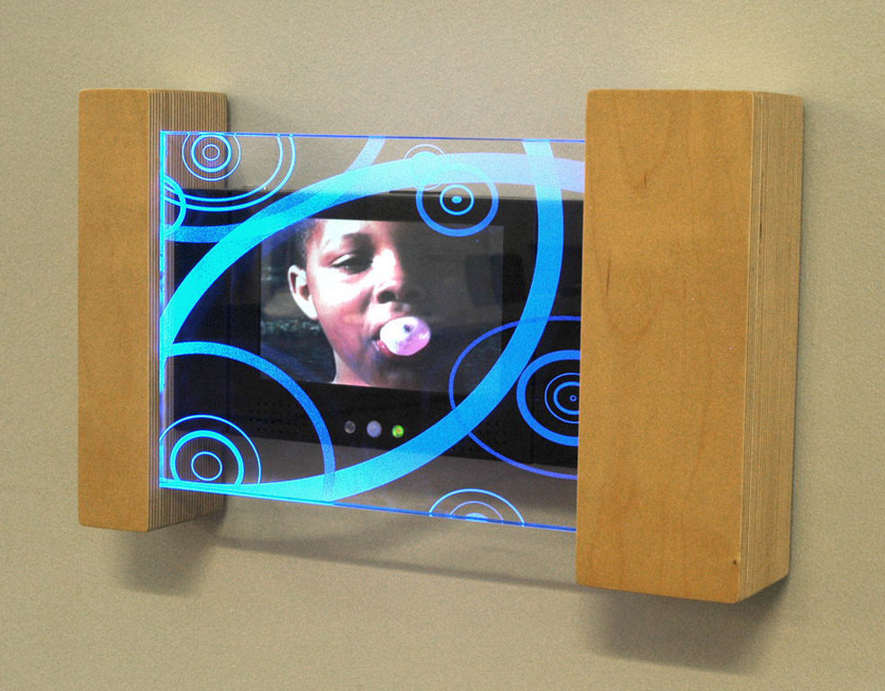  Video Explorers: 1’ 4” x 10” x 3” Baltic birch ply, etched tempered glass, led edge light, solid state media player :: 2009.  Each digital video station was supplied by us with silent video loops of natural and urban communities we discovered during