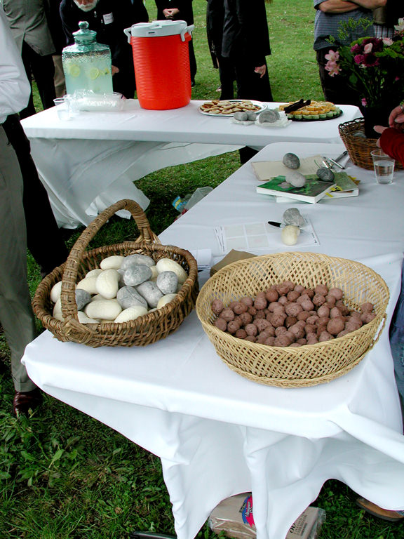  KCAI Brush Creek Community Rain Garden, Kansas City, MO :: 2006-present.  Table with stones and seedballs. The garden was intended from the beginning to be an educational site to teach visitors about storm-water issues and the benefits of native pla