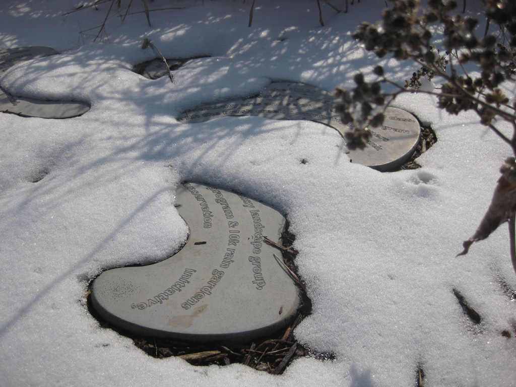  KCAI Brush Creek Community Rain Garden, Kansas City, MO :: 2006-present.  Text stones in the snow. These stones are also a means to thank all those who contributed to this community partnership, and this cluster acknowledges all the people and organ