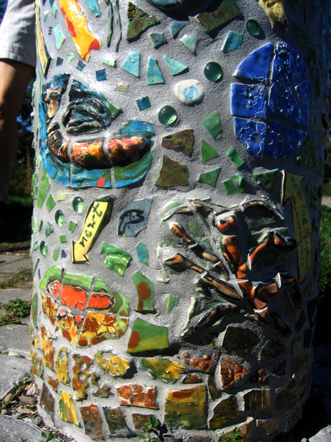  Graham Hill Elementary School, Seattle, WA – Salmon cycle: Freshwater fisher birds and salmon, water jet cut steel and powder coating, installation, salmon is approximately 6” x 12” x 1” :: 2004.  Close up of salmon and heron. During the Grand Openi