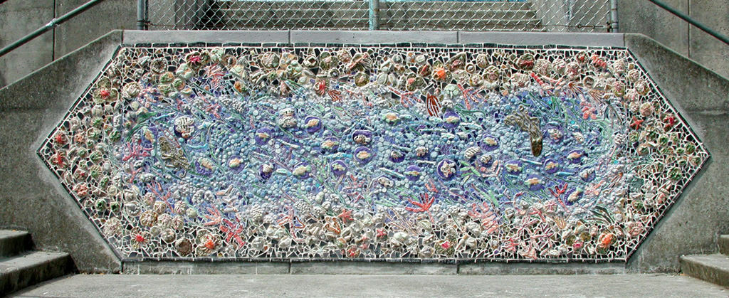  Graham Hill Elementary School, Seattle, WA – Salmon cycle: Tide Pool Mural, high fire ceramic and glass, 12’ x 5’ x 1”:: 2004.  Students at all levels created the creatures, rocks, vegetation, water elements, and diatom border for this tide pool mos