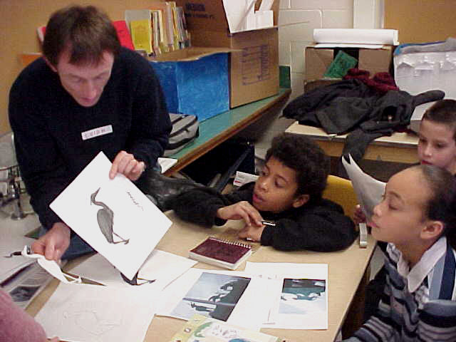  Graham Hill Elementary School, Seattle, WA – Salmon cycle: Teaching component :: 2004.  Leigh teaching. He showed the students how to scan their drawings into a computer, and explained how the birds would be water-jet cut from steel. 