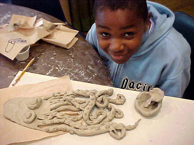 Graham Hill Elementary School, Seattle, WA – Salmon cycle: Teaching component :: 2004.  Making an octopus. We would draw first with the kids, showing them how to make the basic shapes for the different kinds of fish, anemones, crabs, shells, starfis