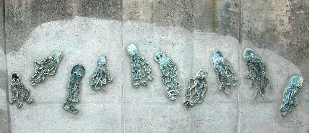  Graham Hill Elementary School, Seattle, WA – Salmon cycle: Octopus school, high fire ceramic, approximately 2’ x 12’ x 1“ :: 2004.  Octopus circle. The expressions on the “faces” of the octopi were quite varied and engaging. 
