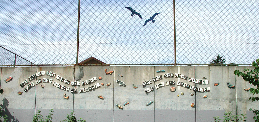  Graham Hill Elementary School, Seattle, WA – Salmon cycle: Poem Line, high fire ceramic, each tile approximately 6” x 6” x 1” :: 2004.  Poem line and gulls. Other children made eggs, embryos, hatchlings and grown salmon to float and swim around the 