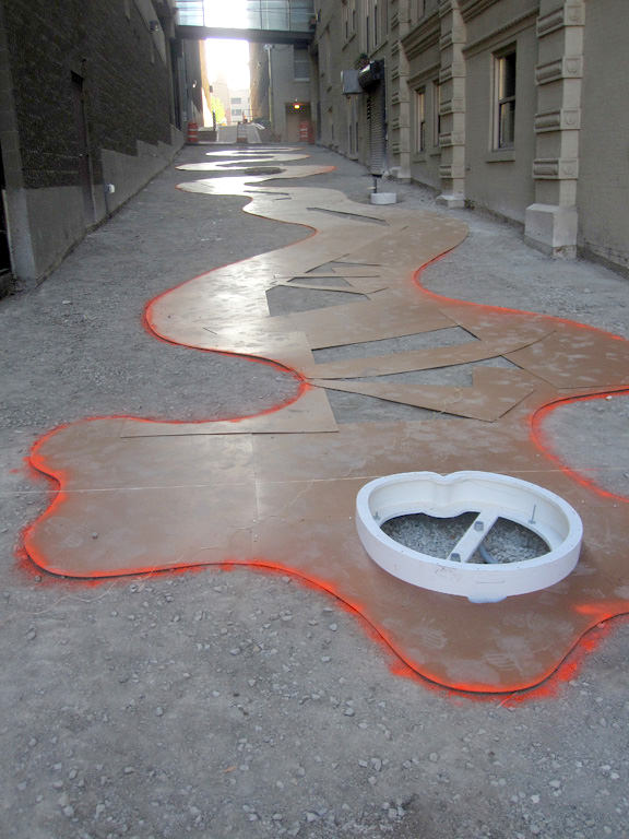  The Commons, downtown Kansas City :: 2012.  Alley from the street end, after demolition, with the stream template and whirlpool template in place. Because we wanted to maintain complex organic curves and were working within a relatively limited budg