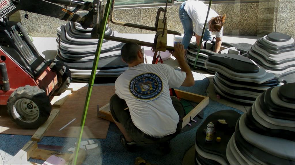  The Commons, downtown Kansas City :: 2012.  Installation of the larger embedded lighting unit on site. The assembled unit made up of HDPE structural components, fiber optics, glass tiles and polyurethane rubber holding everything in alignment weighe