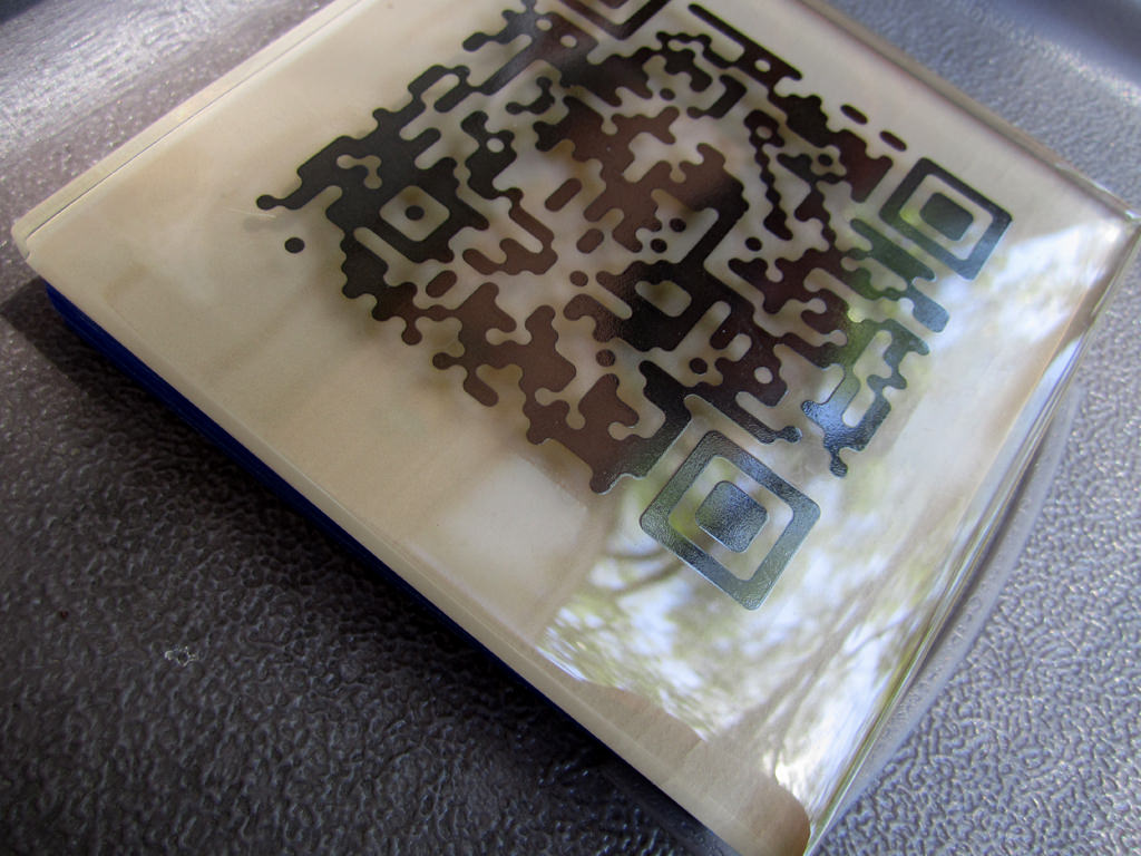  The Commons, downtown Kansas City :: 2012.  The series of story code QR tiles were made by firing digitally printed decals onto off-the-shelf freeze-tolerant glass tiles. 