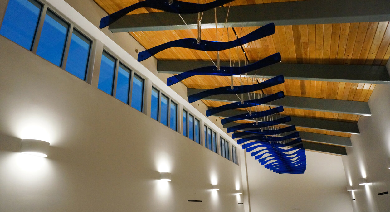  Coffee Creek Ripple Effect, Water Resource Recovery Facility, Edmond, OK :: 2018.  One of the primary features that we needed to accommodate was a sloping ceiling that required a modified bracing system and limited the potential travel of the fins o