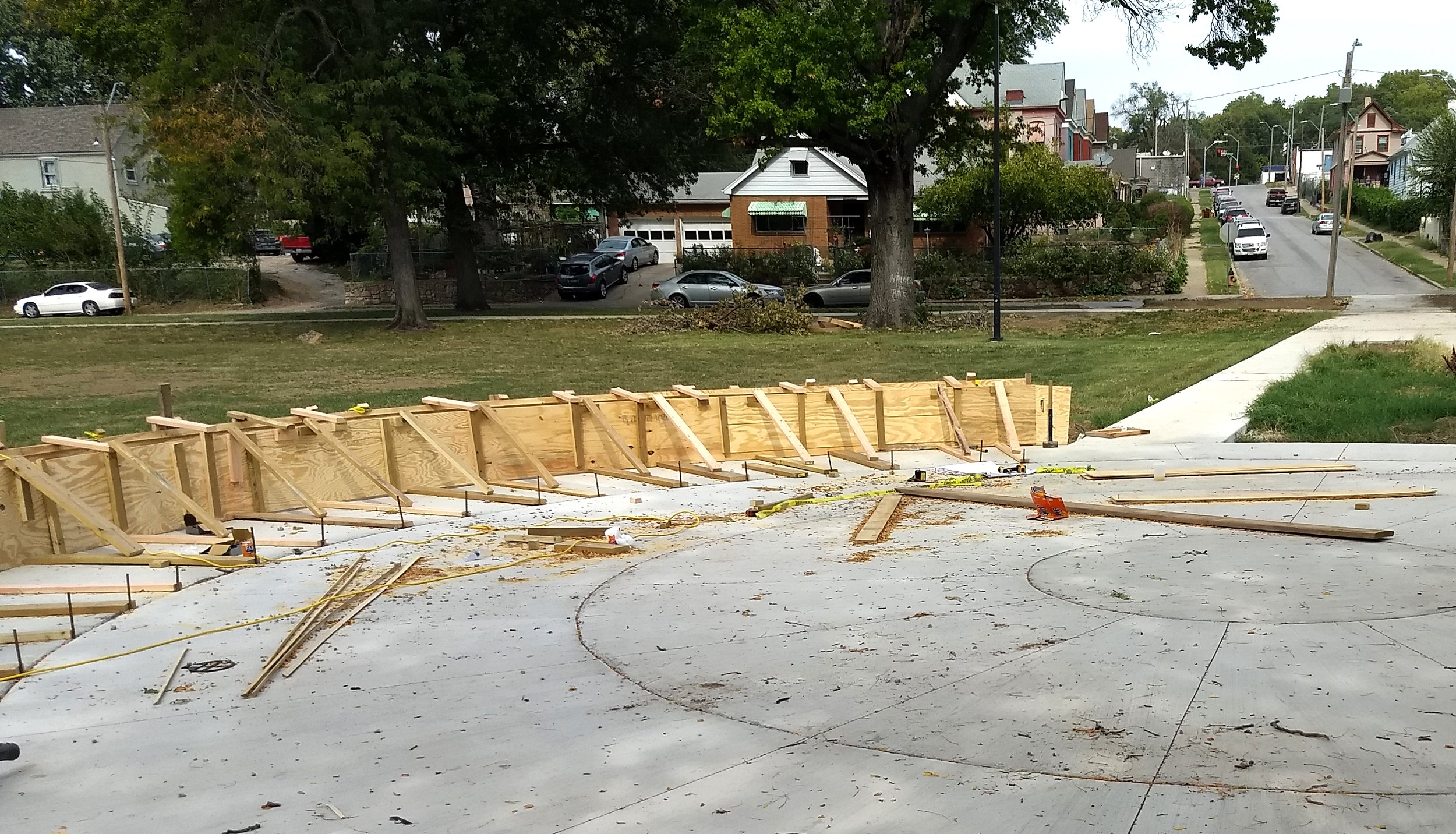 Mutual Aid, Lykins Square Park, East 8th Street and Norton Ave, Kansas City, MO :: 2024 This shows the formwork in place for the benches surrounding the plaza.