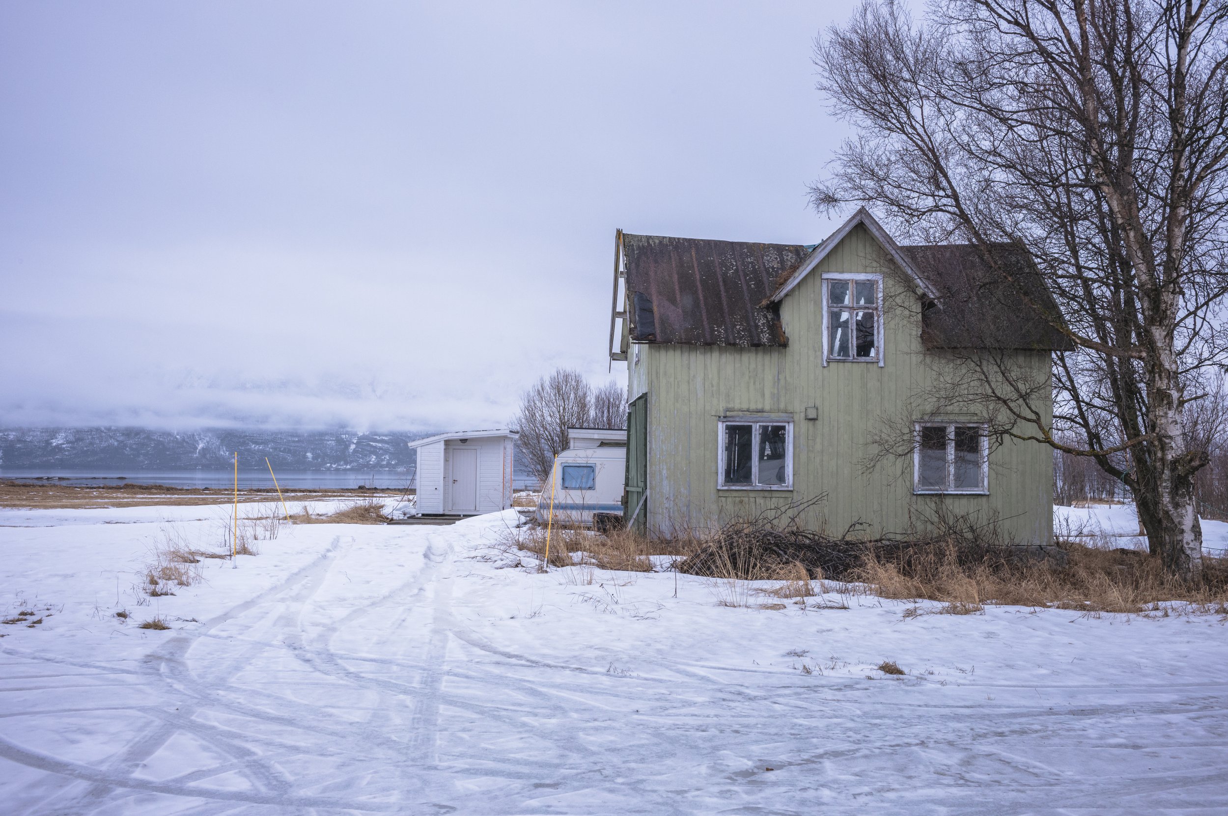 Abandoned house by the fjord.jpg