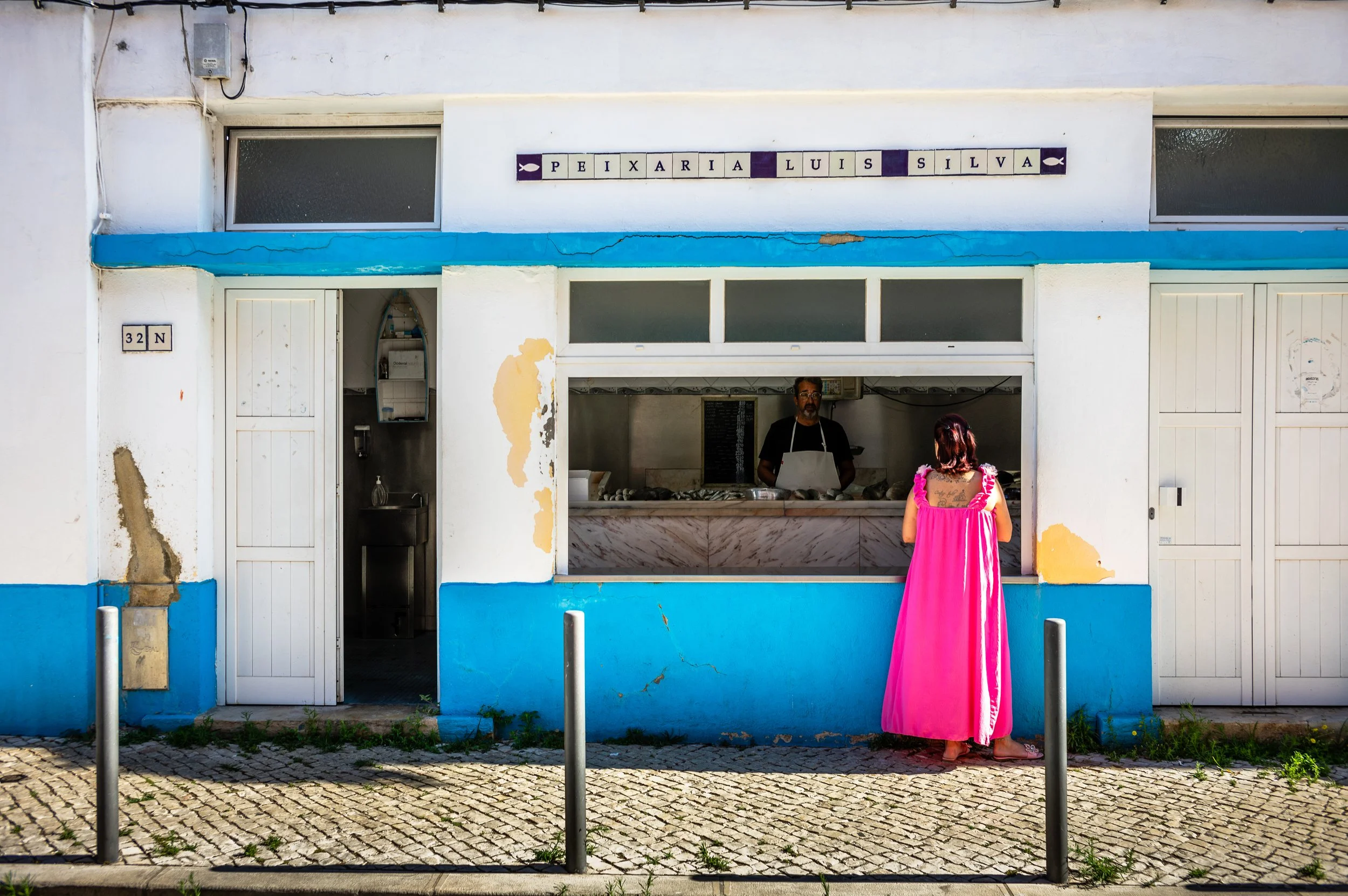 A woman buying fish.jpg