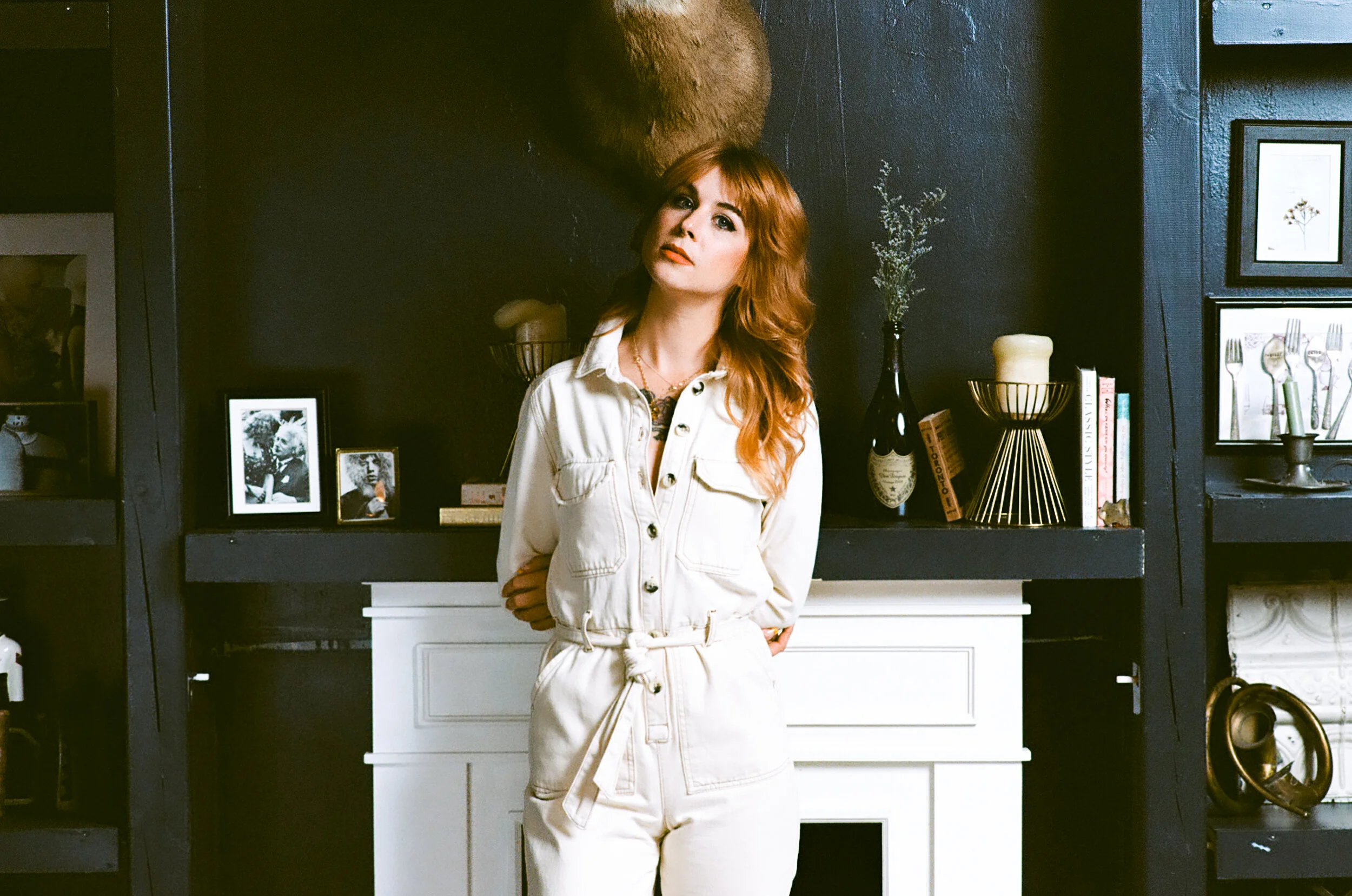 Portrait of Redhead Woman in White Jumper
