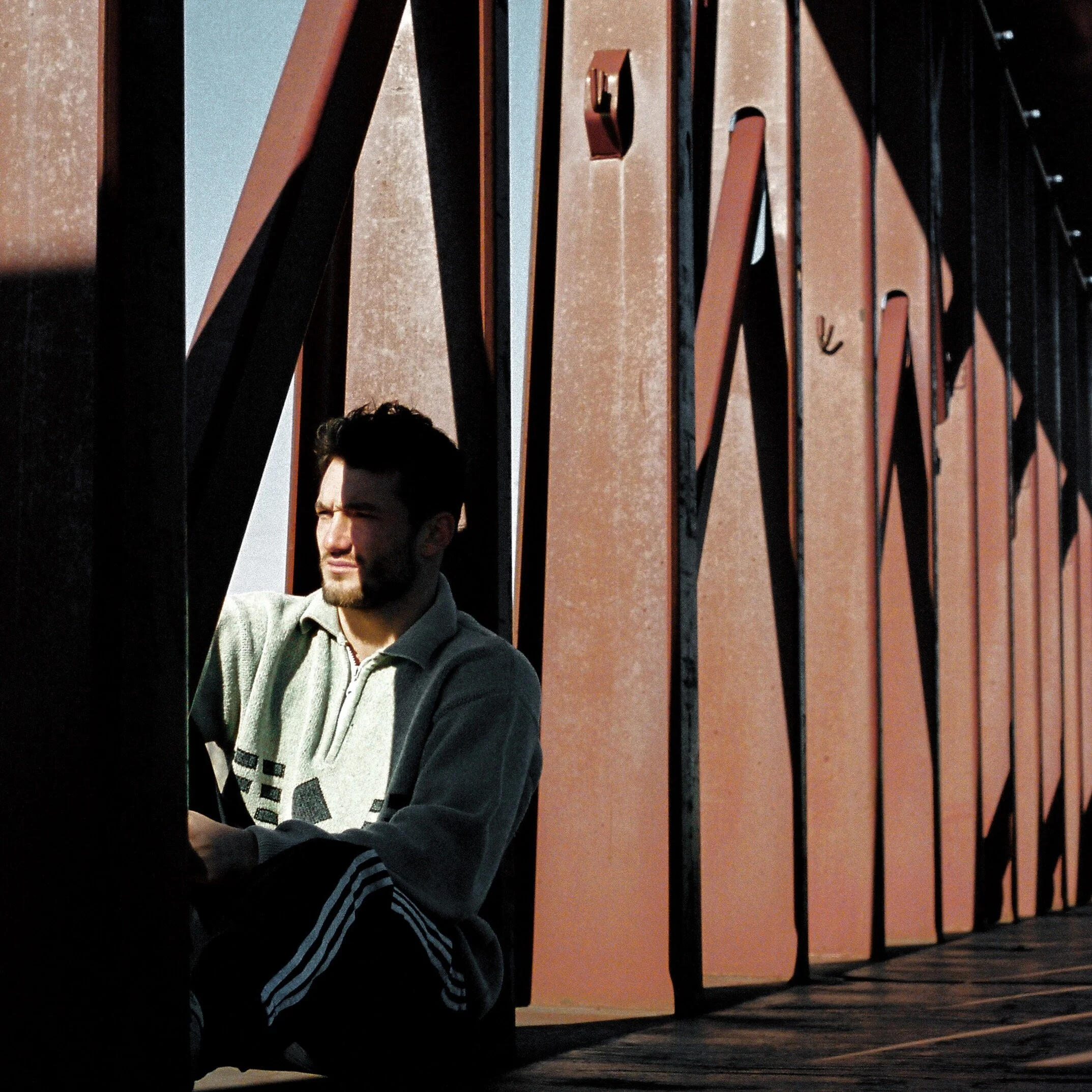 Portrait of Man on Train Car with Light