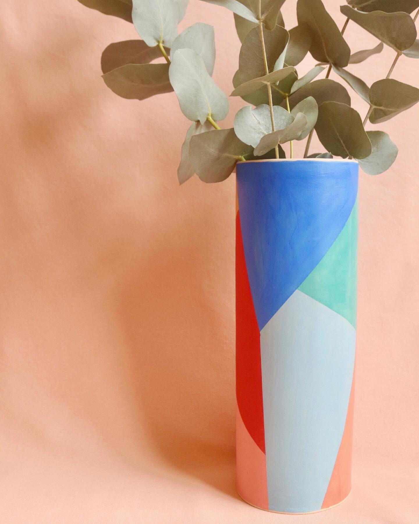 This was a new piece I created this year, using a previous vase form, but incorporating my incredibly popular Rainbow pattern onto it. 

The vase appears different from various angles, as the colours change as you rotate it round. The vase is left in