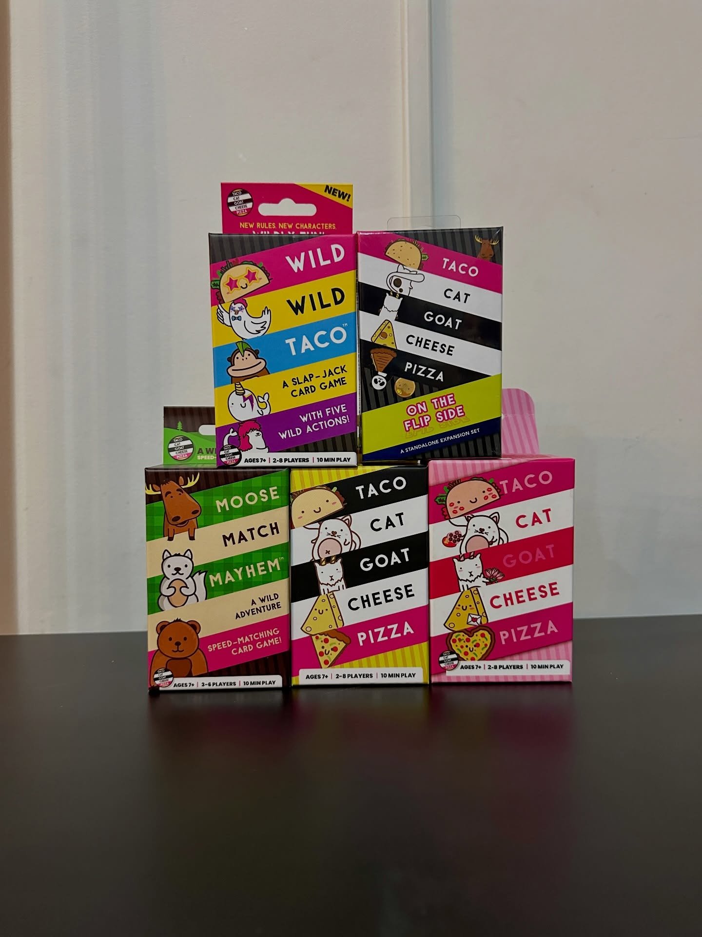 Act fast when the flipped card actually is that taco, cat, goat, cheese, or pizza... 🌮🐈🐐🧀🍕
&bull;
&bull;
&bull;
Taco Cat Goat Cheese Pizza is filled to the brim with hand-slapping mayhem! As in Snap and Dobble, each player places a card from the