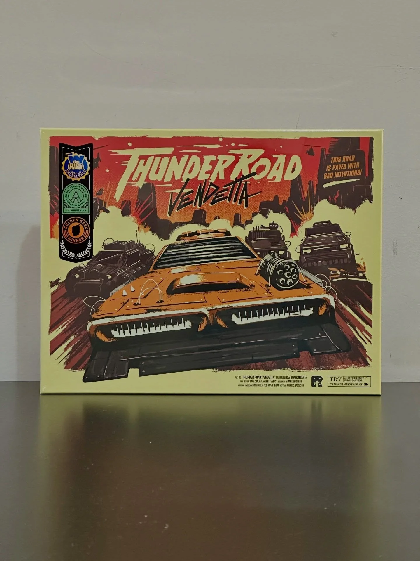 Crews race and shoot to win... or be the last car standing 🏎️
&bull;
&bull;
&bull;
Thunder Road: Vendetta is a revved-up restoration of the classic 1986 game of mayhem on the asphalt. Grab your crew, roll your dice, race your cars, shoot your guns, 