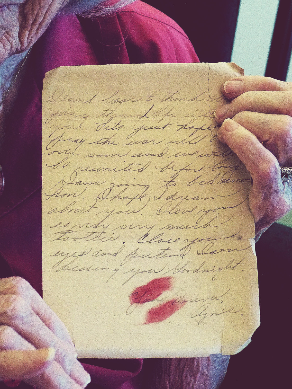   Grandma holding an original letter that she wrote to my Grandpa during WWII.  