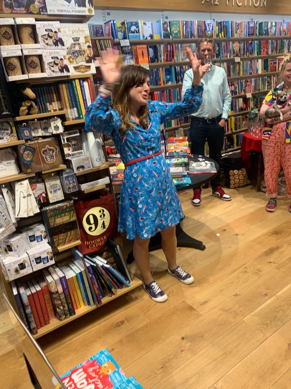 Chrissie performing at a book store.jpeg