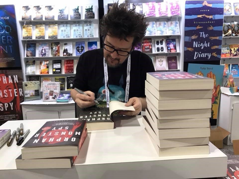 Matt signing books.jpg