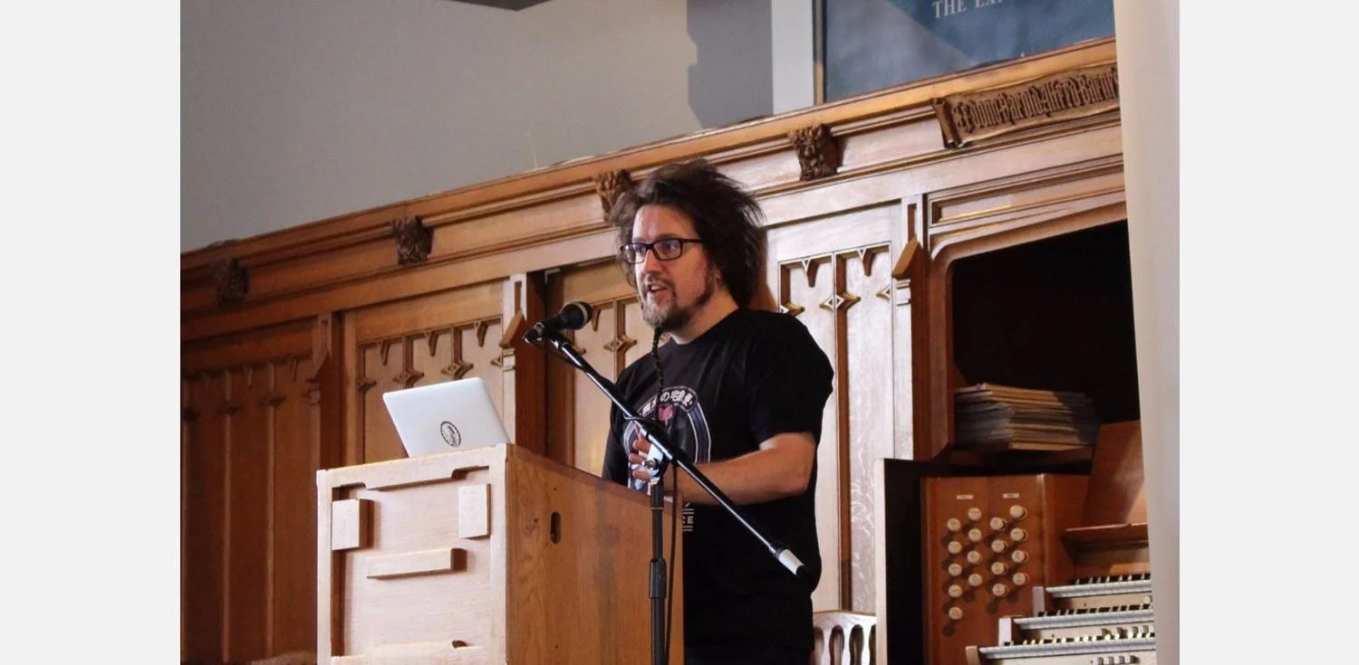 Matt speaking at podium.jpg