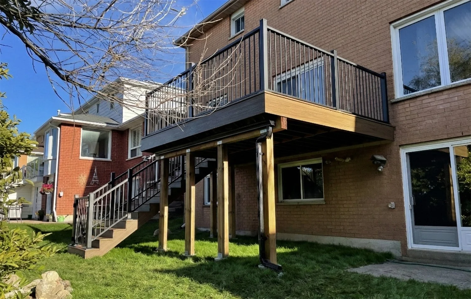 Trex Transcend Composite Deck with Rainescapes Underdeck Drainage and Fortress Aluminum Railings in Ajax, Ontario