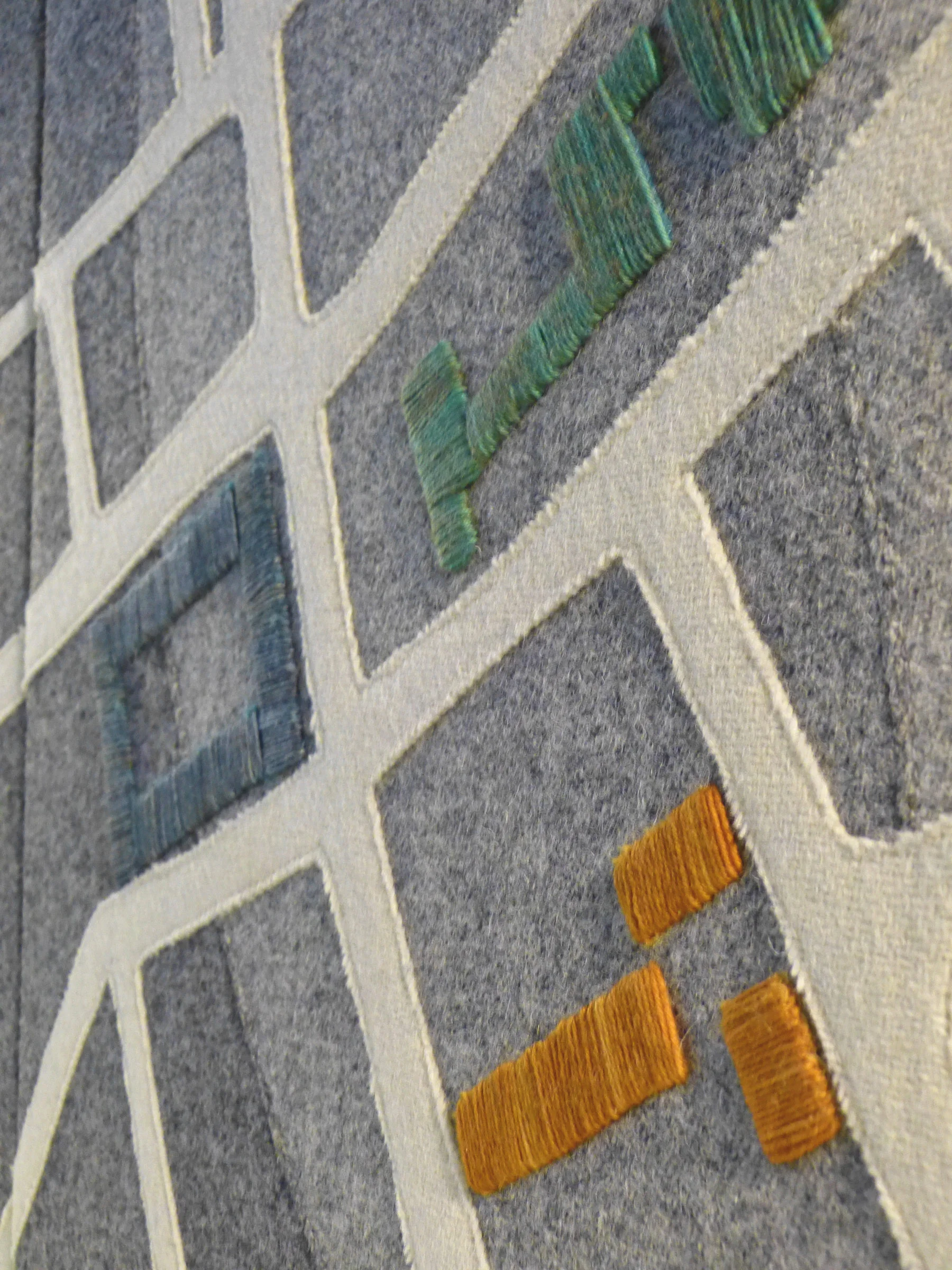 detail of central panel: significant buildings, hand embroidered
