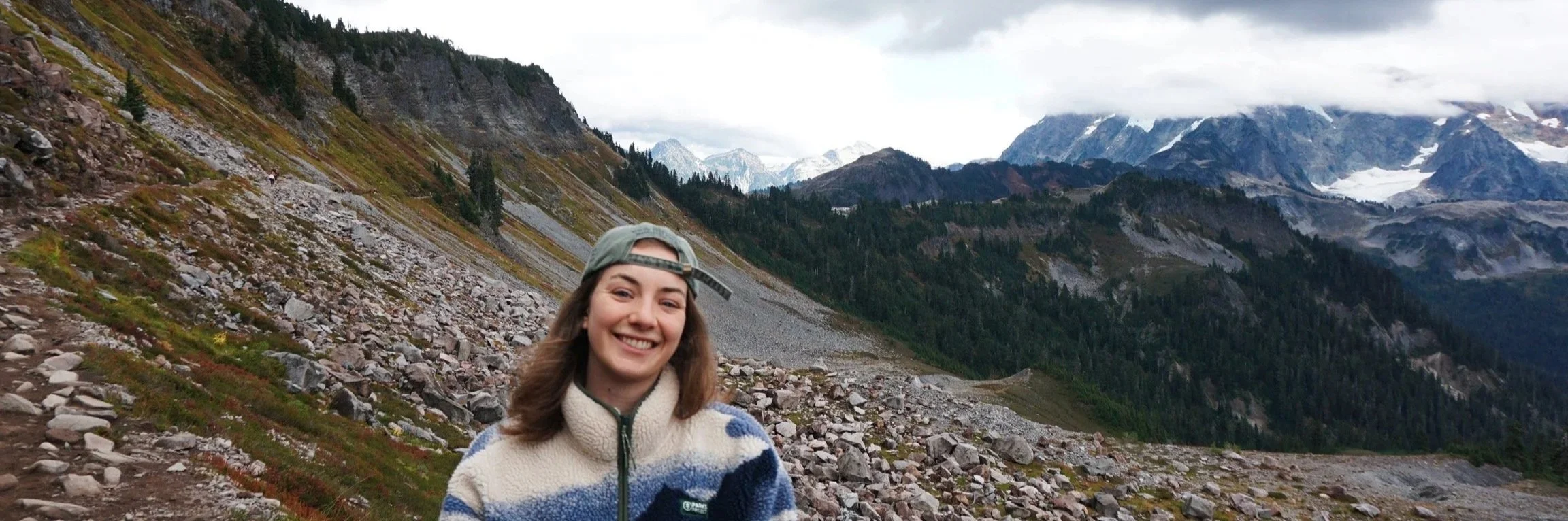 Allyson smiling in the Mt. Baker wilderness