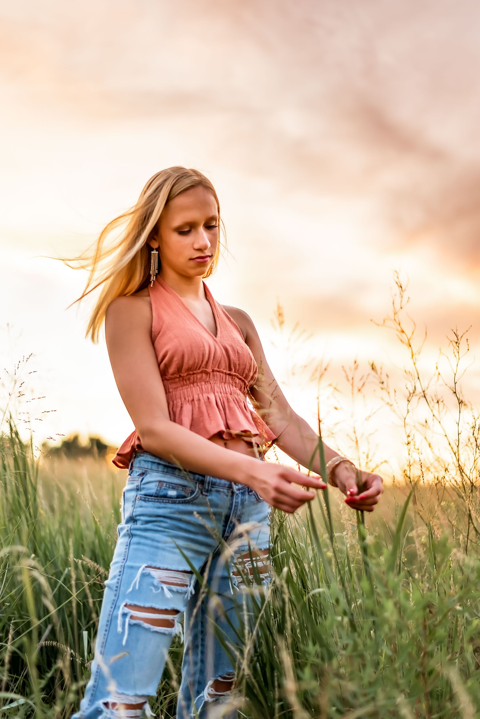 Senior girl at sunset