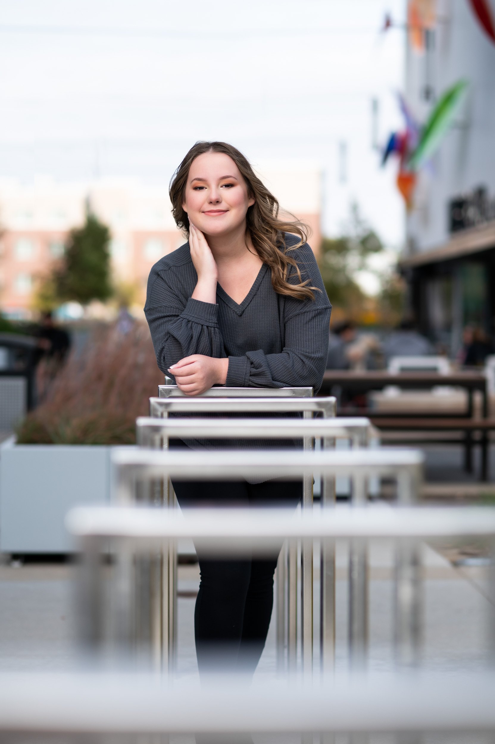 omaha-senior-portrait-urban-session-leading-lines-bike-rack-metal.jpg